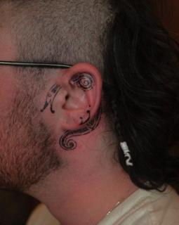 Blackwork abstract swirls tattoo by @2can.tattooer