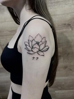 Fine line lotus flower tattoo by @ilias_nyxta