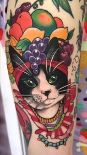 Neo-traditional cat fruit hat tattoo by @abbiewilliamstattoo