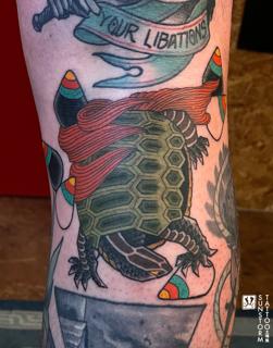 Traditional turtle with scarf tattoo by @sunstormtattoo