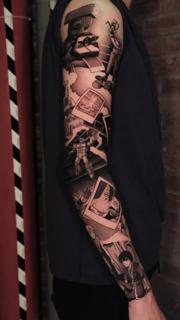 Illustrative black and grey pop culture polaroids tattoo by @adamdeanart