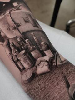 Realism apothecary items tattoo by @adamdeanart