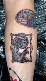 Illustrative e.t. character tattoo by @adsnowden_tattoo