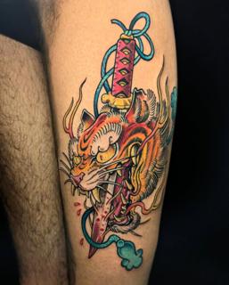 Neo-traditional tiger sword tattoo by @angelo.oxblood