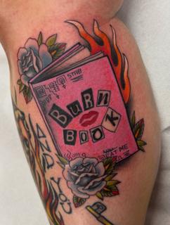 Neo-traditional burn book flames tattoo by @bratbabytattoo