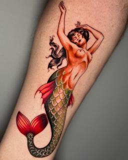 Traditional pin-up mermaid tattoo by @_.aleek