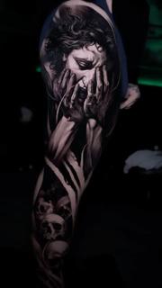 Realism crying figure tattoo by @alx.tattooart