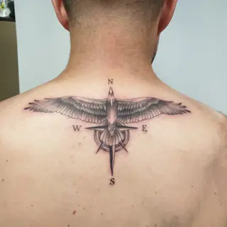 Blackwork compass bird tattoo by @alexingart
