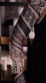 Blackwork geometric geometric patterns tattoo by @nero.prenta