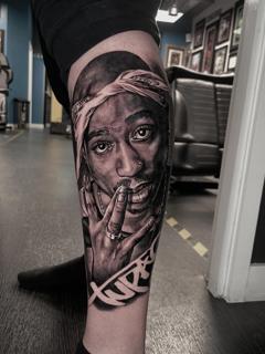 Realism portrait with bandana tattoo by @alex_rattray_ink