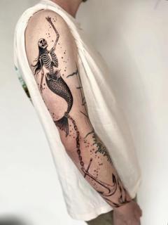 Blackwork skeleton mermaid tattoo by @inked_by_alice