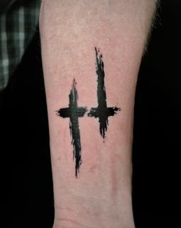 Blackwork brushstroke crosses tattoo by @angie_needs_ink