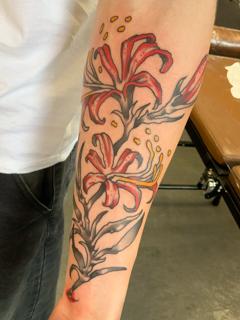 Illustrative floral floral lilies tattoo by @eagles_of_swindon