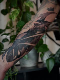 Blackwork feather tattoo by @axana.elektra.tattoo