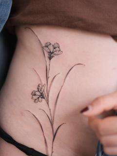 Fine Line floral design tattoo by @betstattoo