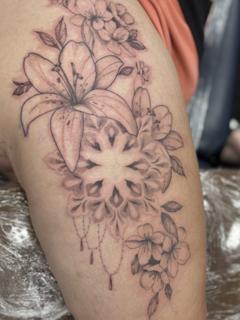 Fine line floral mandala tattoo by @skinnysinktattoo