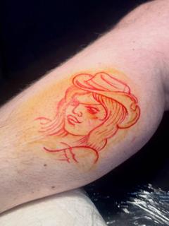 Fine line woman with hat tattoo by @_blayn_