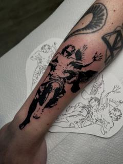 Blackwork angelic figure tattoo by @pokeeboi