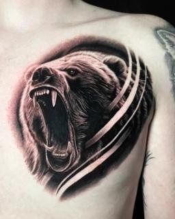 Realism roaring bear tattoo by @skibber_tattoo