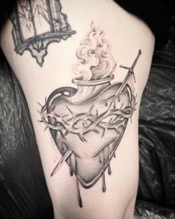 Blackwork sacred heart tattoo by @chazappletattoo