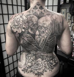 Realism skeletons flowers tattoo by @chazappletattoo