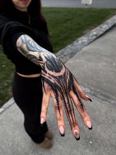 Blackwork abstract tribal tattoo by @charliegatestattoo