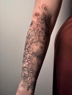 Realism floral animal tattoo by @charliexneedles