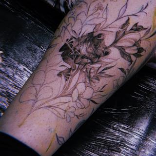 Fine line frog with flowers tattoo by @charliexneedles