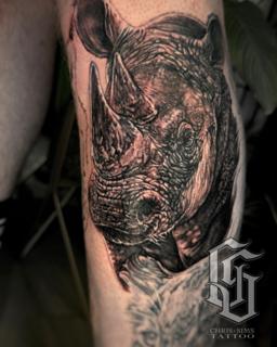 Realism rhino portrait tattoo by @chrissimstattoo
