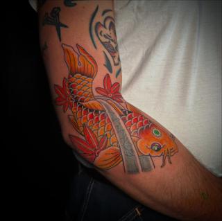 Japanese koi fish tattoo by @radntrad.tattoos