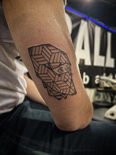 Geometric geometric face tattoo by @radntrad.tattoos