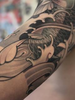 Japanese koi fish waves tattoo by @chrishenriksen