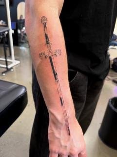 Fine line ornate sword tattoo by @jiffaloaf