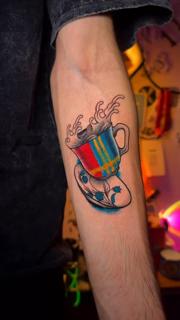 Illustrative steaming teacup tattoo by @moch.tattoo