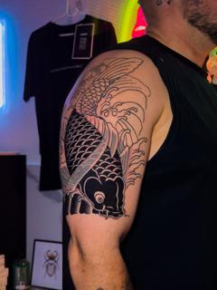 Japanese koi fish tattoo by @moch.tattoo