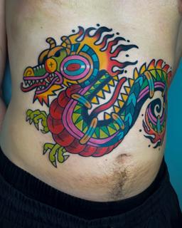 Traditional traditional dragon tattoo by @bitros_tattoo