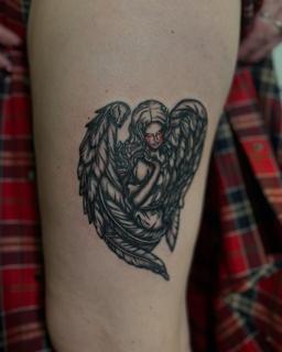 Illustrative crying angel tattoo by @claretatts