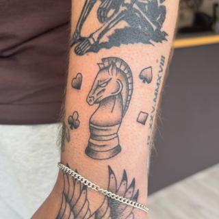 Traditional chess knight tattoo by @courtz_tattoo