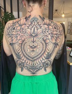 Ornamental ornamental mandala heart tattoo by @courtz_tattoo