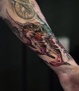 Realism abstract skull tattoo by @crawlspace_tattoo