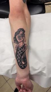 Traditional mermaid heart tattoo by @ctptattoo