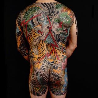 Japanese tiger and dragon tattoo by @damienrodriguez