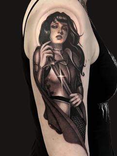 Realism woman with sword tattoo by @danijtattoo