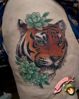 Illustrative tiger succulents tattoo by @danielletaylor