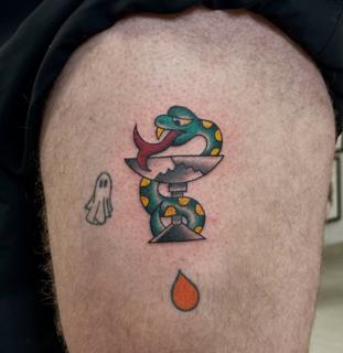 Traditional snake and dagger tattoo by @fitz.ttt