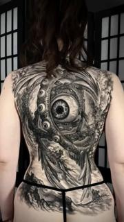 Realism mechanical eye tattoo by @dinos.mts
