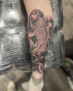 Japanese koi fish tattoo by @divineeyetattoo