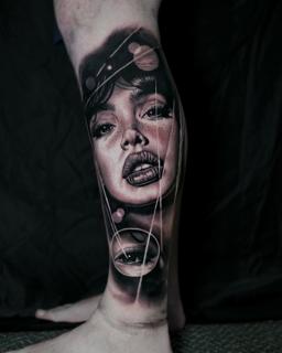 Realism surreal portrait tattoo by @donnafarahtattoo