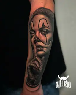 Realism clown woman tattoo by @dostattoo_marios
