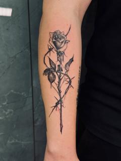 Blackwork thorny rose tattoo by @_drag.tats